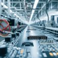 Computer chips assembly line in manufacturing plant, modern electronics production factory